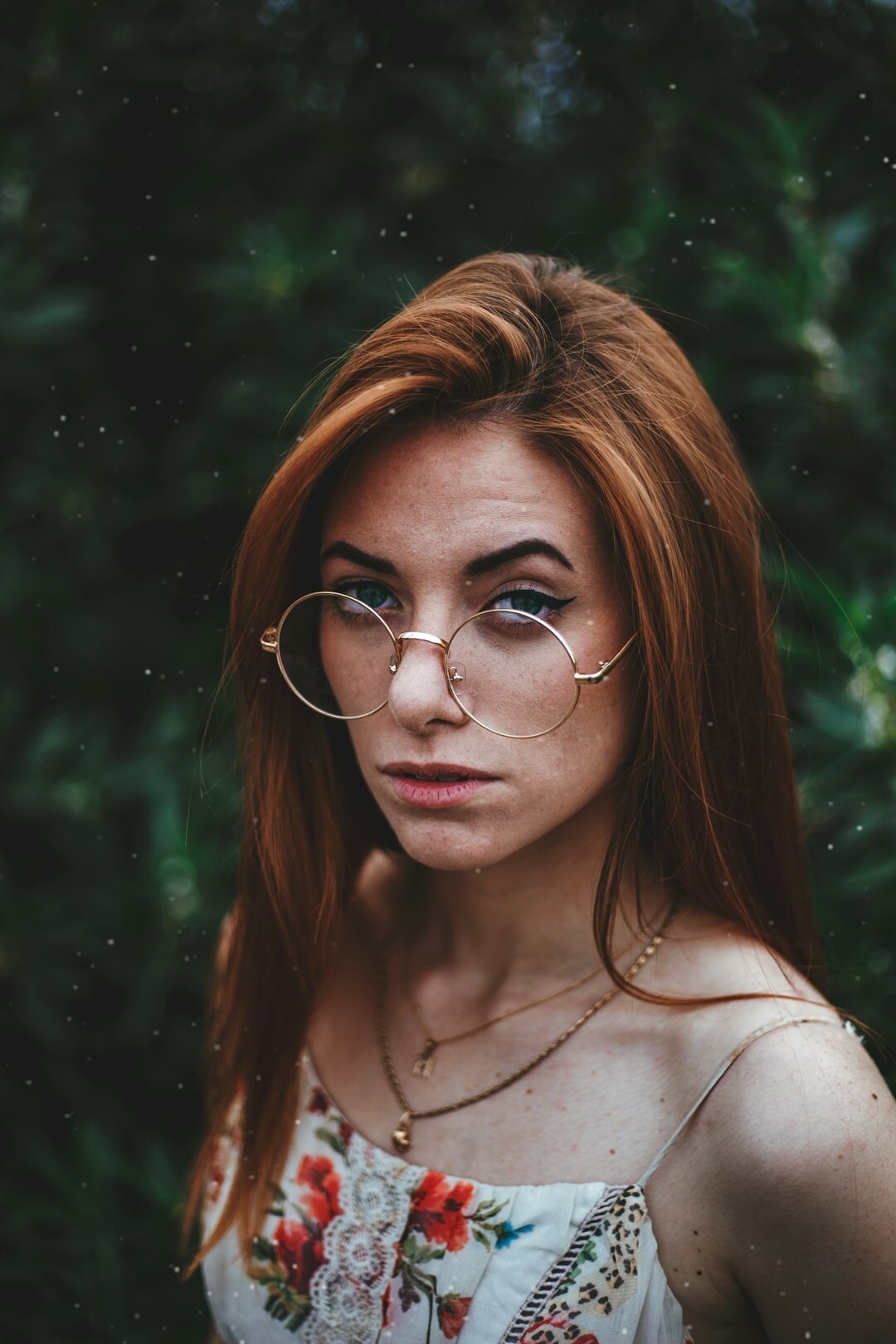 Portrait of a young woman with red hair